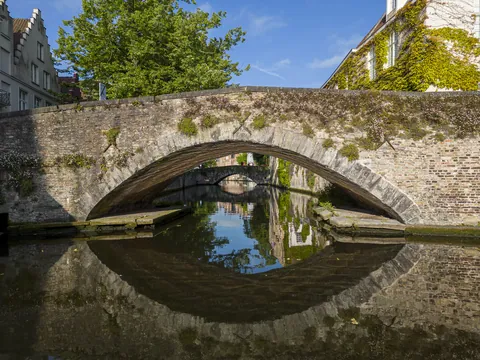 Bridge reflection, main canal, Bruges