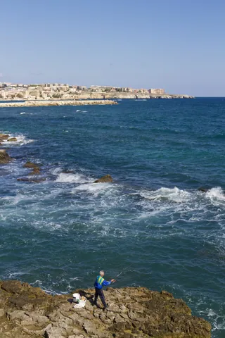 Lone fisherman, Ortigia